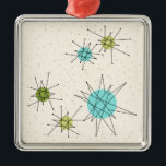 Iconic Atomic Starbursts Christmas Ornament<br><div class="desc">This Iconic Atomic Starbursts Christmas Ornament pattern features iconic atomic starbursts. That’s right! The old school, cream coloured background with gold speckles is the perfect backdrop for the vibrant turquoise, soothing celery, and kitschy pear green coloured circles. The spots of colour are sporadically placed in various sizes with overlaying black...</div>