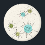 Iconic Atomic Starbursts Round Magnet<br><div class="desc">This Iconic Atomic Starbursts Round Magnet pattern features iconic atomic starbursts. That’s right! The old school, cream coloured background with gold speckles is the perfect backdrop for the vibrant turquoise, soothing celery, and kitschy pear green coloured circles. The spots of colour are sporadically placed in various sizes with overlaying black...</div>