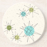Iconic Atomic Starbursts Sandstone Coaster<br><div class="desc">This Iconic Atomic Starbursts Sandstone Coaster pattern features iconic atomic starbursts. That’s right! The old school, cream coloured background with gold speckles is the perfect backdrop for the vibrant turquoise, soothing celery, and kitschy pear green coloured circles. The spots of colour are sporadically placed in various sizes with overlaying black...</div>