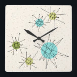 Iconic Atomic Starbursts Square Wall Clock<br><div class="desc">This Iconic Atomic Starbursts Square Acrylic Wall Clock (large print) pattern features iconic atomic starbursts. That’s right! The old school, cream coloured background with gold speckles is the perfect backdrop for the vibrant turquoise, soothing celery, and kitschy pear green coloured circles. The spots of colour are sporadically placed in various...</div>