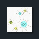 Iconic Atomic Starbursts Wrapped Canvas<br><div class="desc">This Iconic Atomic Starbursts Wrapped Canvas pattern features iconic atomic starbursts. That’s right! The old school, cream coloured background with gold speckles is the perfect backdrop for the vibrant turquoise, soothing celery, and kitschy pear green coloured circles. The spots of colour are sporadically placed in various sizes with overlaying black...</div>