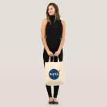 Iconic NASA Grocery Tote Bag (Pluto Cream)<br><div class="desc">IMPORTANT NOTICE: NASA Insignia and identifiers provided and used with permission of NASA.</div>