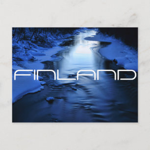 Icy blue river on cold winter evening postcard