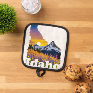 Idaho shape with mountain and wildflowers pot holder
