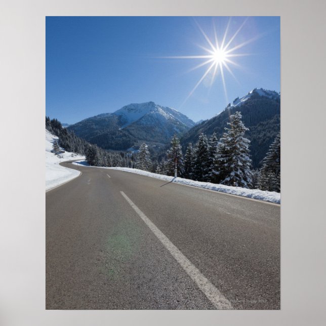 Idyllic empty road thrugh a winter landscape, poster (Front)