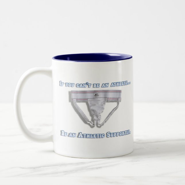 If you can't be an athlete... Two-Tone coffee mug (Left)