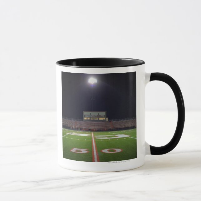 Illuminated American football field at night Mug (Right)
