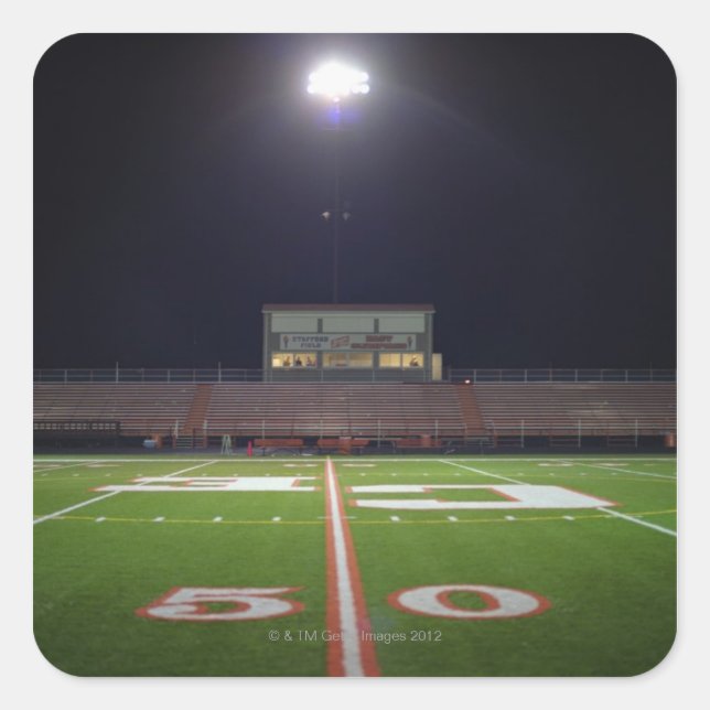 Illuminated American football field at night Square Sticker (Front)