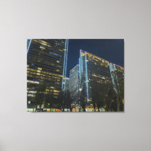 Illuminated Cityscape at Nighttime Canvas Print