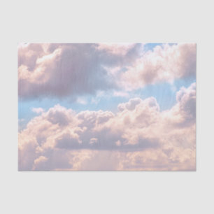 Illuminated pink fluffy clouds in a blue sky tissue paper