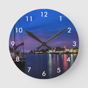 Illuminated Volendam harbor at night Round Clock
