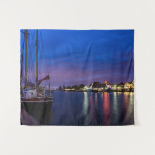Illuminated Volendam harbor at night Tapestry