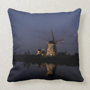 Illuminated windmill at Blue Hour throw pillow