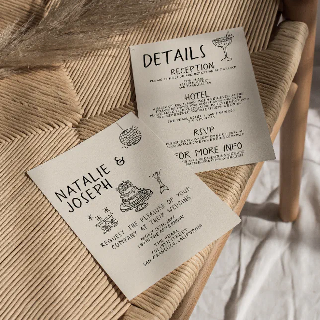 A wedding invitation with a hand-drawn illustration, placed on a wicker table.