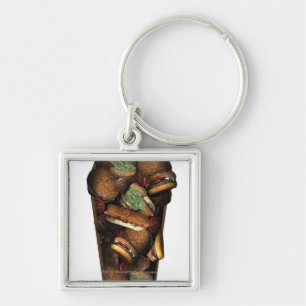 Illustration of a coffin filled with fast food key ring