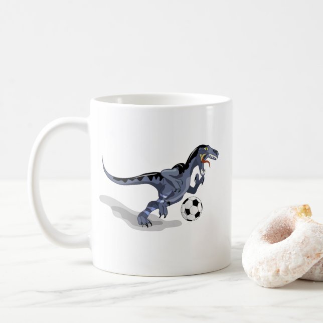 Illustration Of A Raptor Dinosaur Playing Soccer. Coffee Mug (With Donut)