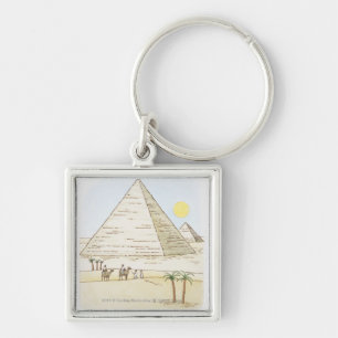 Illustration of pyramids and men with camels key ring