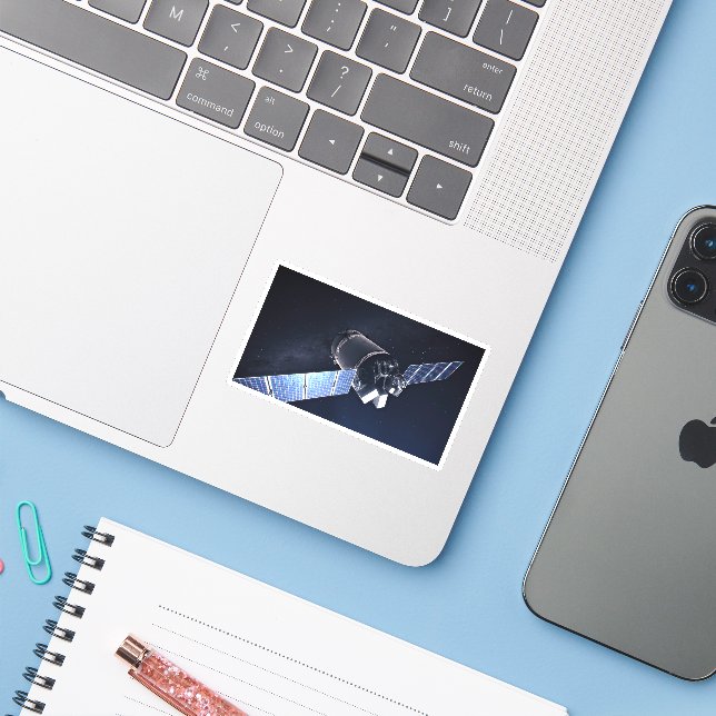 Illustration Of The Dragon Xl Spacecraft. (Laptop w/ iPhone)