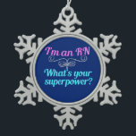 I'm a RN Superhero Snowflake Pewter Christmas Ornament<br><div class="desc">I'm an RN,  what's your superpower? A funny registered nurse gift in blue with pretty teal and pink writing.</div>