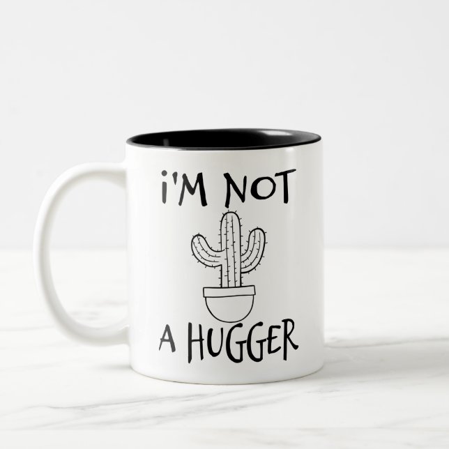I'm Not A Hugger Funny Cactus  Two-Tone Coffee Mug (Left)
