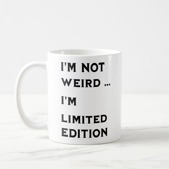 i'm not weird coffee mug (Left)