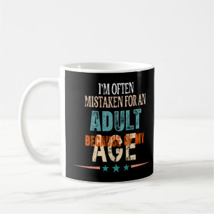 i'm often mistaken for an adult because of my age coffee mug