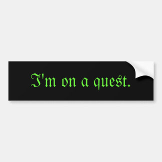 I'm on a quest bumper sticker. Black. Bumper Sticker