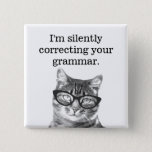 I'm silently correcting your grammar button<br><div class="desc">I'm silently correcting your grammar button. Funny pin with cute cat and humourous quote for teacher. Grammar police slogan with picture of nerdy kitten in reading glasses. Education humour for men women and kids. Cute kitty with custom text. Fun gifts for cat lover or cat person.</div>