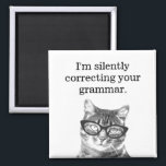 I'm silently correcting your grammar fridge magnet<br><div class="desc">I'm silently correcting your grammar fridge magnet. Cute nerdy cat with reading glasses. Geeky kitten with funny grammar police slogan. Funny kitty design with quote for school teacher. Education humour with animal picture.</div>