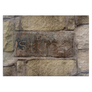 "I'm Stuck" another brick in the wall Cutting Board