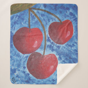 Image of my artwork cherries sherpa blanket