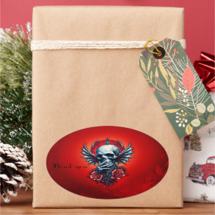 Impressive, realistic skull with wings  oval sticker