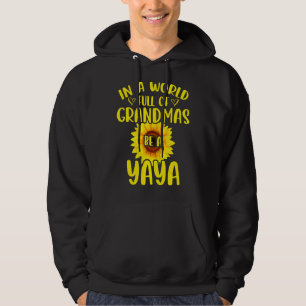 In A World Full Of Grandmas Be A Yaya Sunflower Mo Hoodie