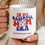 IN MY BASEBALL MOM ERA VINTAGE RETRO TEAM NAME COFFEE MUG<br><div class="desc">Get ready to show off your baseball mum pride with our delightful coffe mug : a charming vintage font saying "in my baseball mum era" coupled with a heart-shaped baseball to tug at your heartstrings. We've left a special space just for your team's name, allowing you to personalise this design...</div>