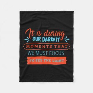 In Our Darkest Moments We Must Focus Light Philoso Fleece Blanket