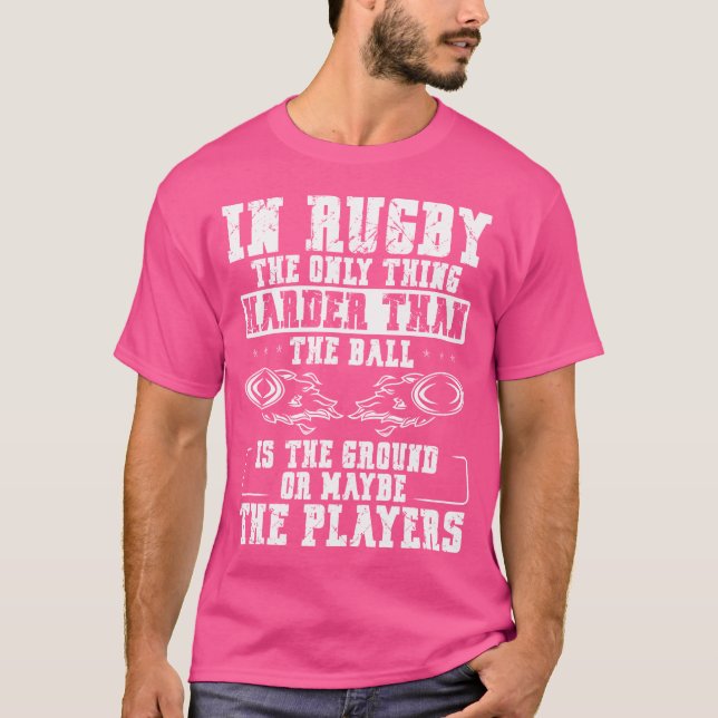 In Rugby The Only Thing Harder Than The Ball Is Th T-Shirt (Front)