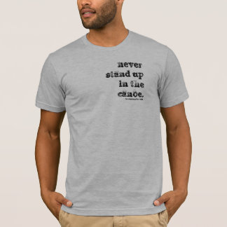 in the canoe. T-Shirt
