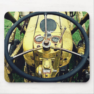 In the Driver's Seat of an Antique Yellow Tractor Mouse Mat