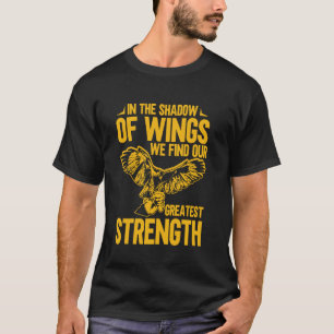 In the Shadow of Wings We Find Our Greatest Streng T-Shirt
