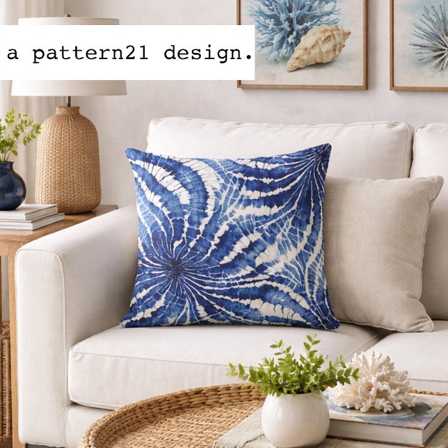 indigo and white abstract tie dye pattern cushion (Indigo shibori pillow brings relaxed coastal texture to bright beach inspired spaces.)