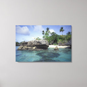 Indonesia. Rock formations along shore Canvas Print