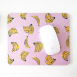 Initial Hipster Banana Pattern in Pink Background Mouse Mat<br><div class="desc">This design features a banana seamless pattern in yellow and hand drawn strokes over a pink background.

The illustrations have been hand drawn by me,  Clàudia Orengo,  the artist behind this store. Digital artwork with textured details,  perfect for kids,  home decor and women tech apparel or business stationery.</div>