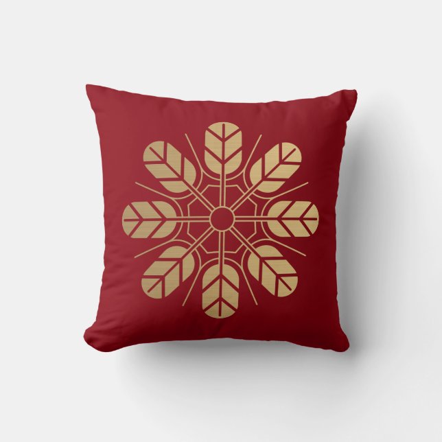 Inoue clan kamon in brushed faux gold on red cushion (Front)