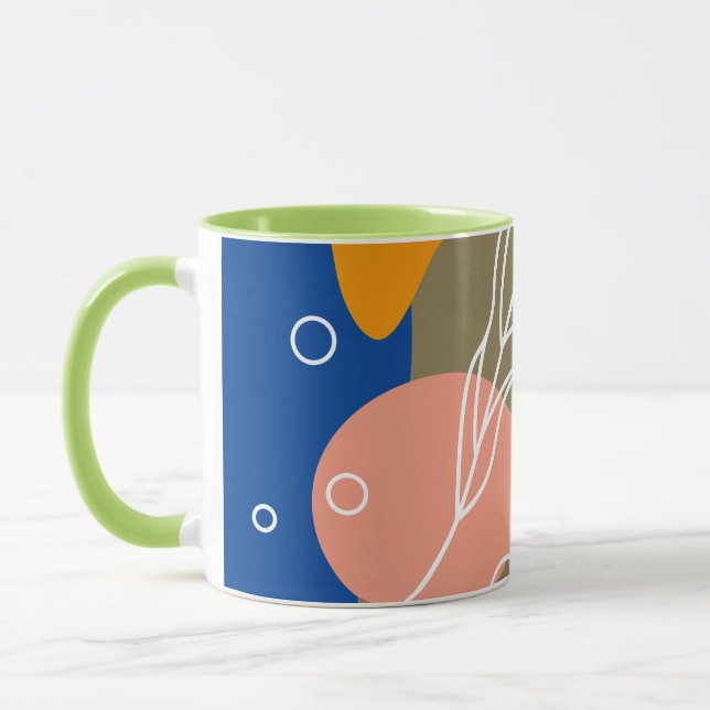 Interesting abstract spots with leaves mug (Left)