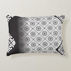 Intricate black and white pattern featuring floral decorative cushion