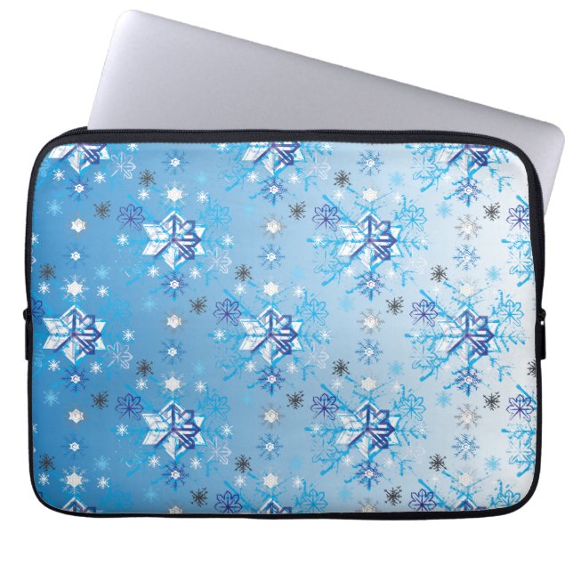 Intricate blue and white stars and snowflakes laptop sleeve (Front)