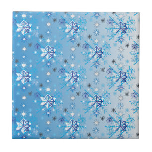 Intricate blue and white stars and snowflakes tile