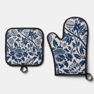 Intricate blue floral pattern on light background oven mitt & pot holder set