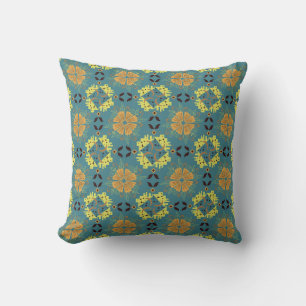 Intricate floral and geometric pattern with orange cushion