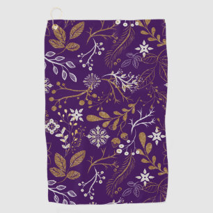 Intricate floral pattern with gold and white golf towel
